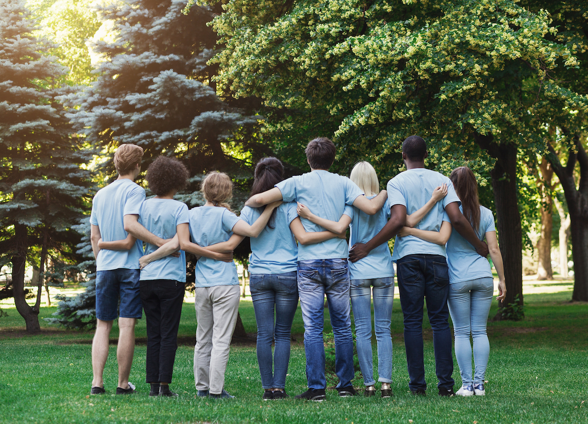 Volunteering,,People,And,Ecology,Concept.,Group,Of,Volunteers,Embracing,In picture